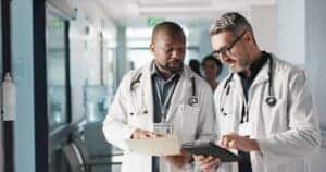 Doctors reviewing charts