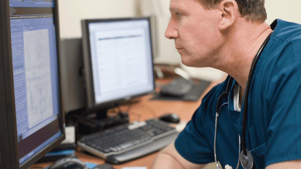 Medical professional reviewing patient documentation to enhance clinical efficiency